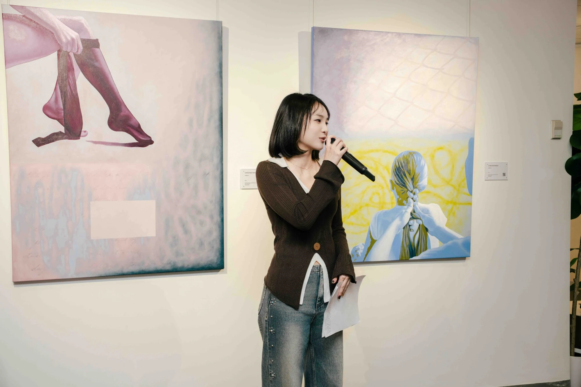 Rose Li speaking at an exhibition
